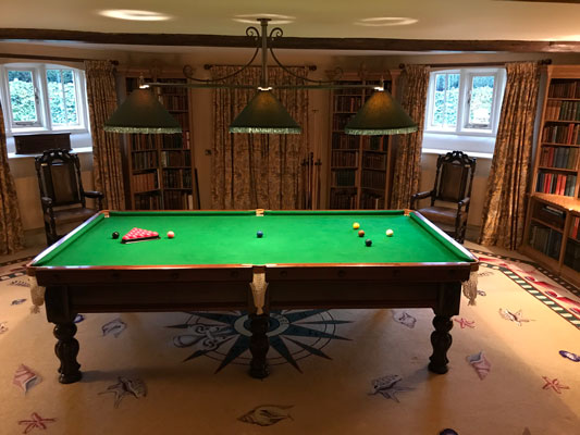 A private snooker room to be cleaned